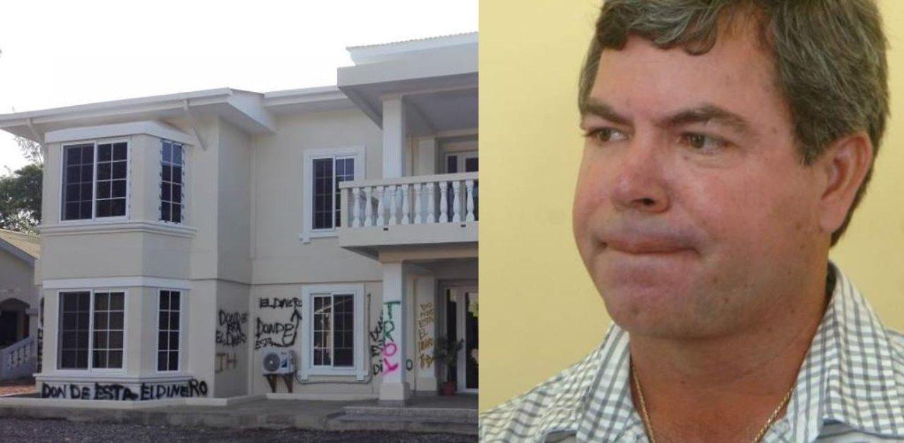 Imagen Principal de Nota: Alcalde de Utila ofrece L 25 mil por información del responsable de pintar ¿Dónde está el dinero?, en el edificio municipal