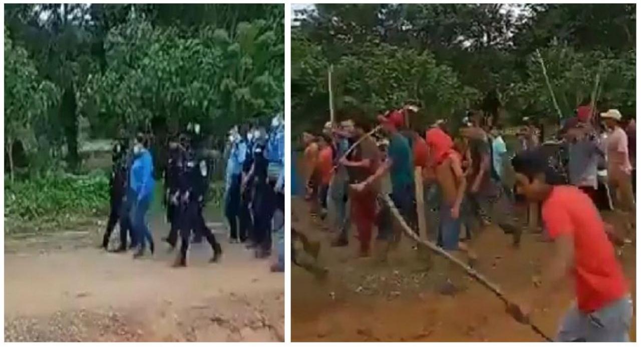 Imagen Principal de Nota: Con palos y  piedras en mano  pobladores sacan a la fuerza a fiscales y policías en Corinto durante la operación 'Chakal'