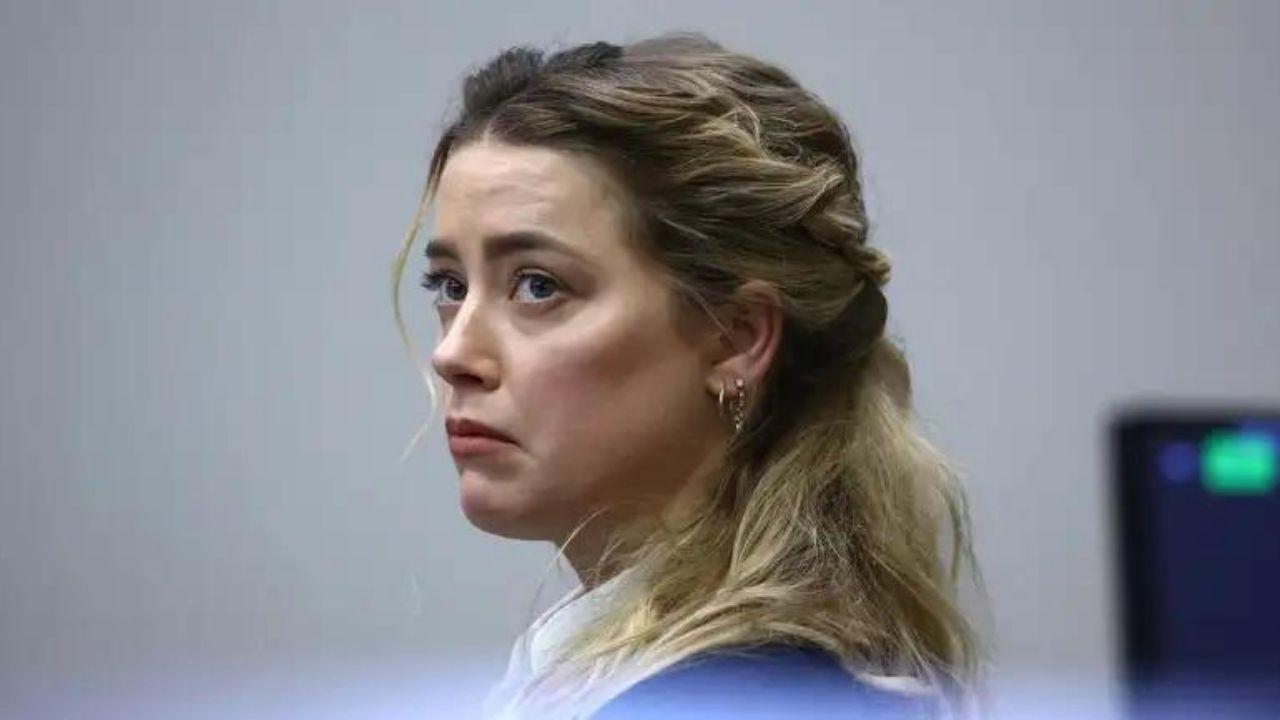 Imagen de Amber Heard contiene las lágrimas mientras muestra vídeo de Johnny Depp golpeando gabinetes