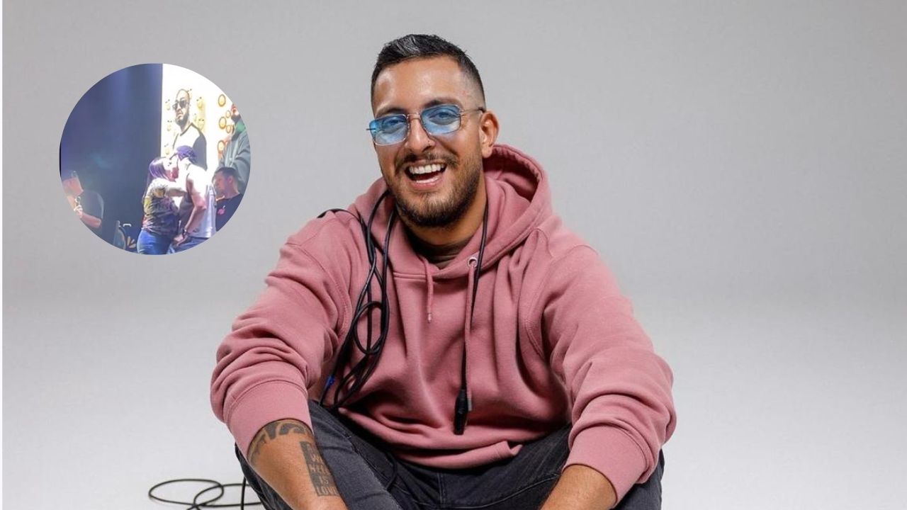 Imagen Principal de Nota: ¡Beso en vivo! Seguidora aprovecha y besuquea a Fancony en el show