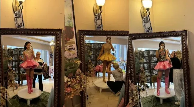 Carlota de Lovo vistiendo a las palillonas frente al espejo