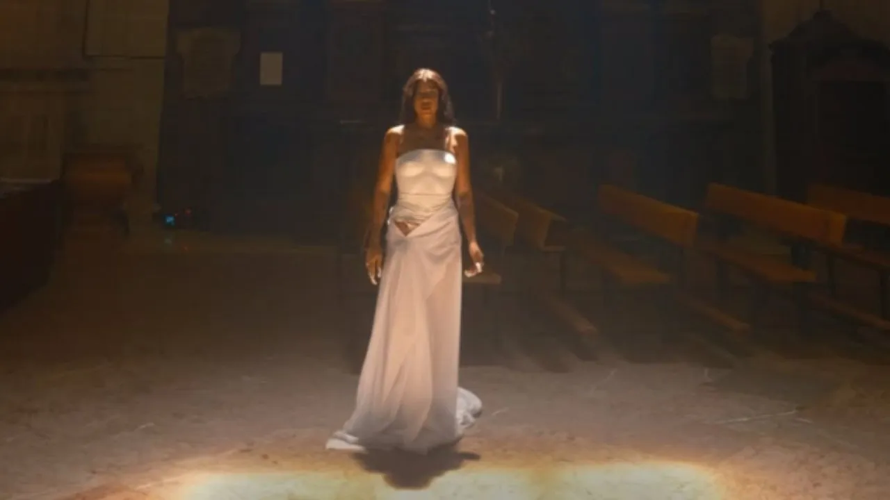 Imagen Principal de Nota: Demandan a Tokischa por grabar video semidesnuda dentro de iglesia en España